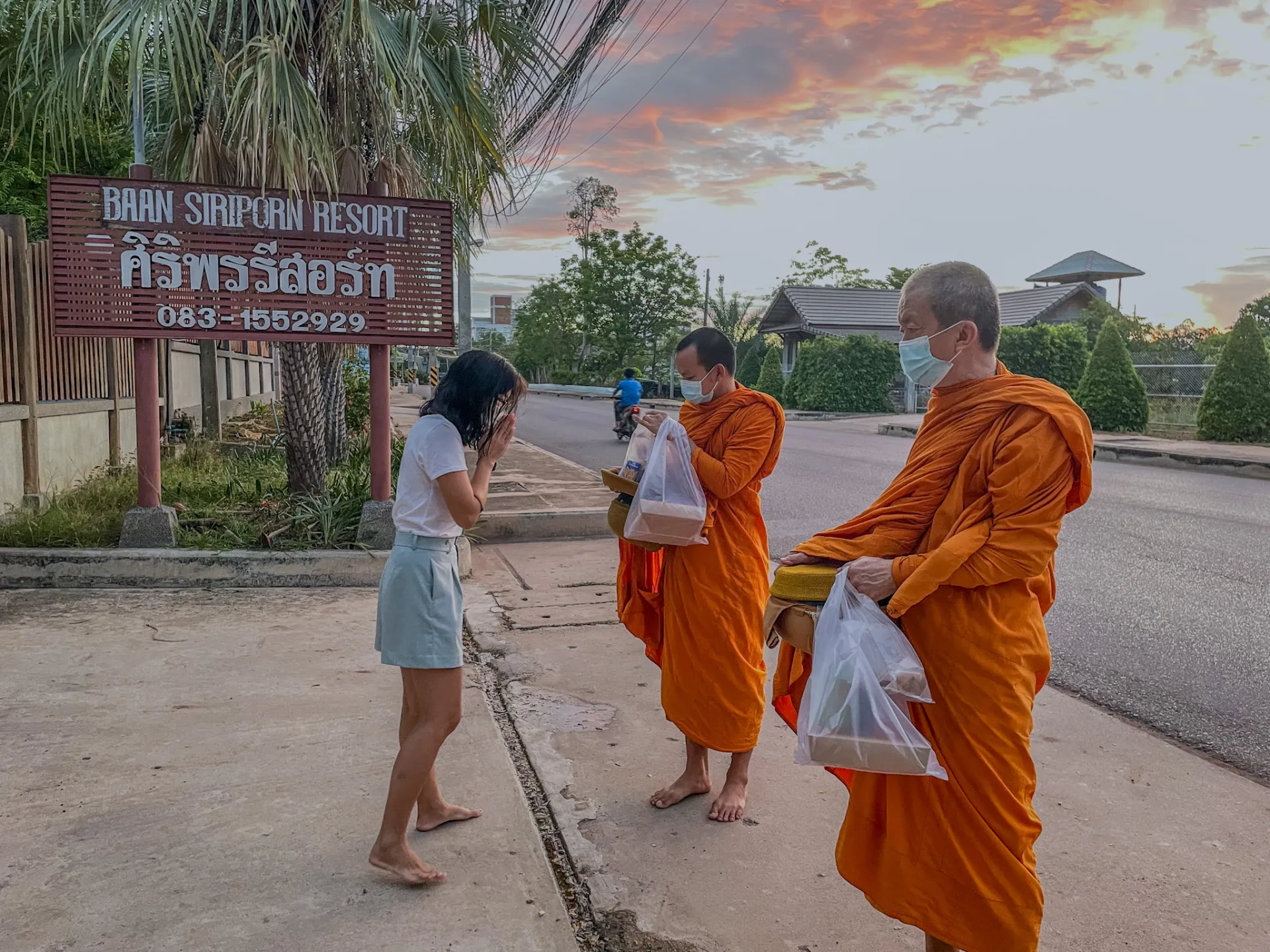 Alms Giving by the road